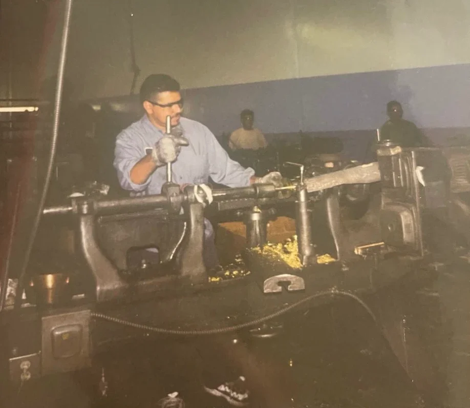 Raul Rizo spinning a part by hand in the 1990s
